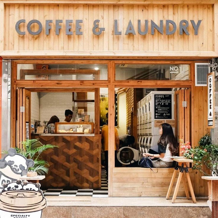 Cozy Cafe Design Blending Coffee Shop and Laundry Service with Natural Elements