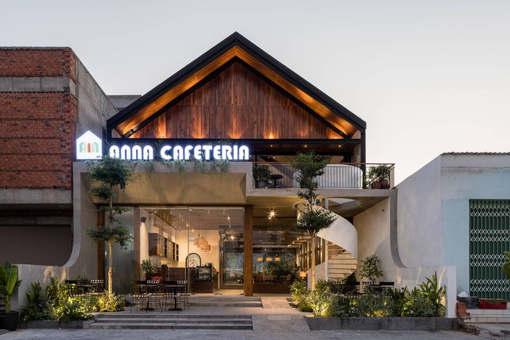 Modern Cafe Design Blends Rustic Charm with Contemporary Architecture and Inviting Atmosphere