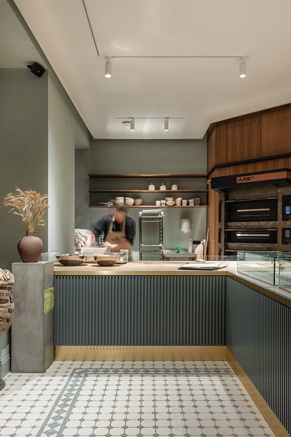 Harmonious Cafe Design: A Cozy Blend of Textures, Colors, and Natural Materials