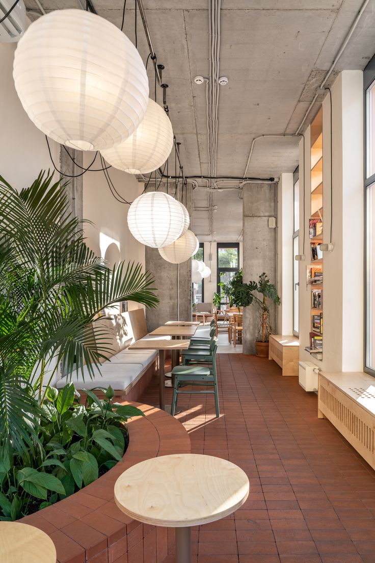 Inviting Cafe Design: A Harmonious Blend of Nature and Modern Aesthetics