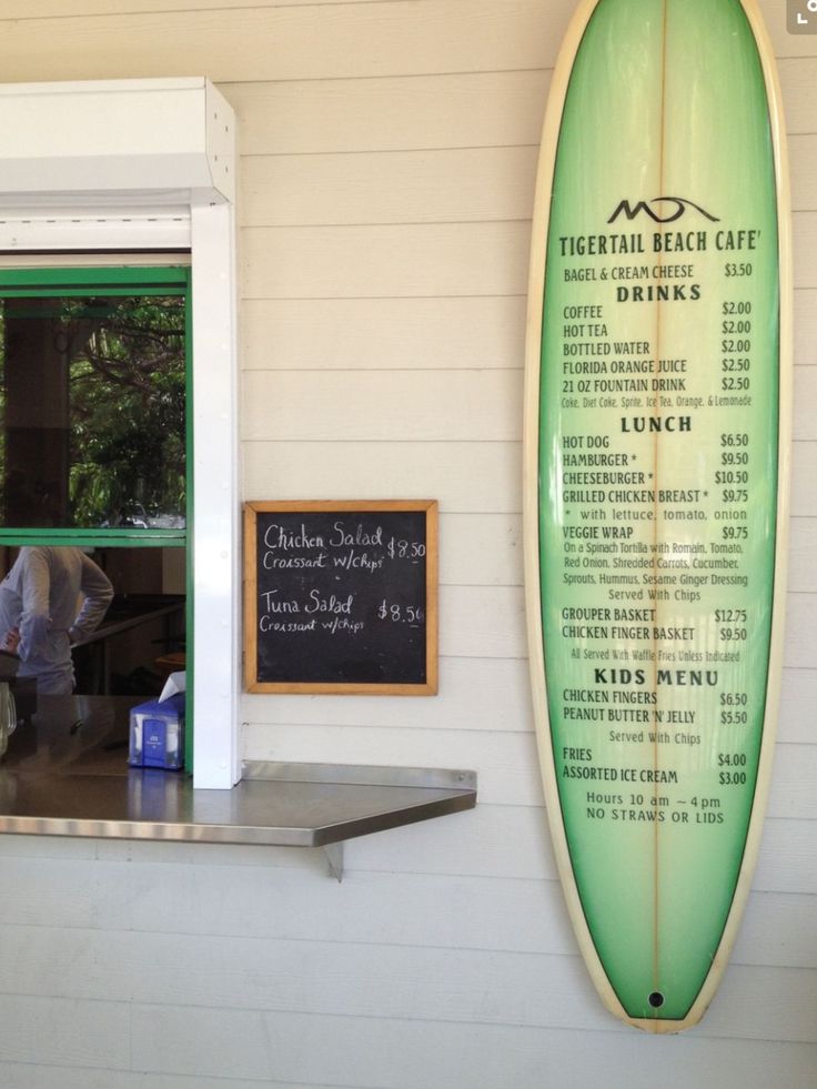 Coastal-Inspired Cafe Design: A Relaxing, Beachy Vibe with Surfboard Menu and Inviting Decor