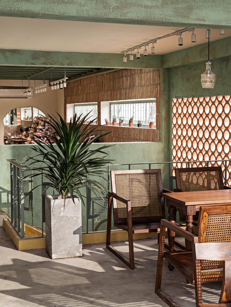 Harmonious Cafe Design: Modern Textures and Natural Elements Create a Welcoming Atmosphere