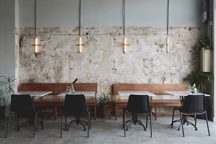 Minimalist Cafe Design Fuses Rustic Charm with Modern Sophistication