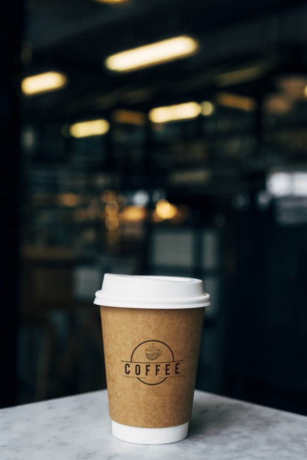 Chic Cafe Ambiance: Minimalist Takeaway Coffee Cup on Marble Table