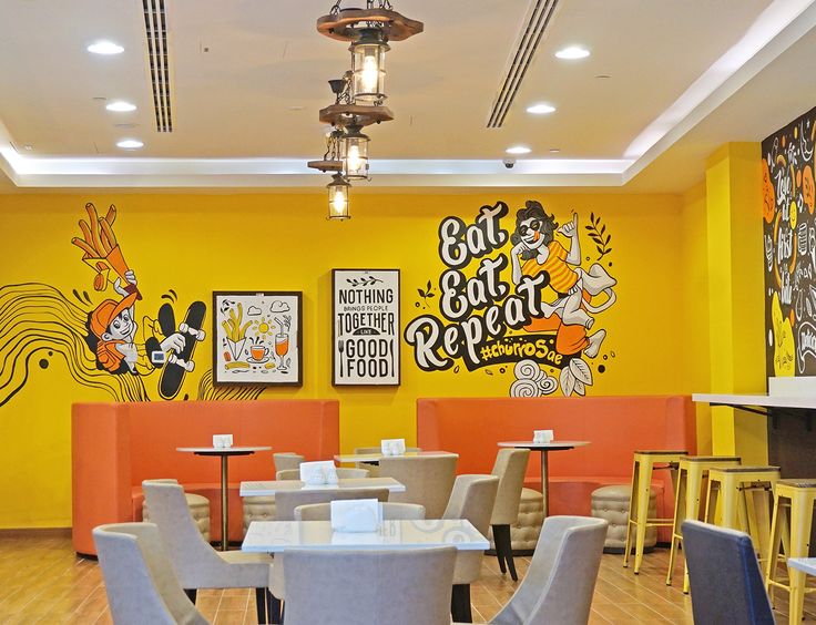 Vibrant Cafe Design Blends Playful Aesthetics with Inviting Comfort