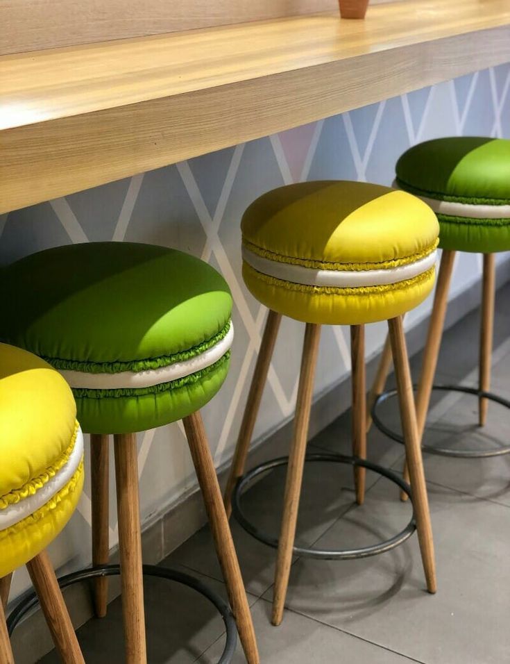 Whimsical Cafe Design with Macaron-Inspired Stools and Playful Aesthetic