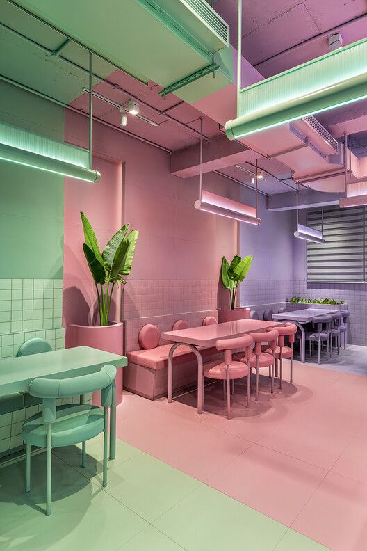 Vibrant Pastel Cafe Design Blends Playfulness and Minimalism for a Stylish Atmosphere