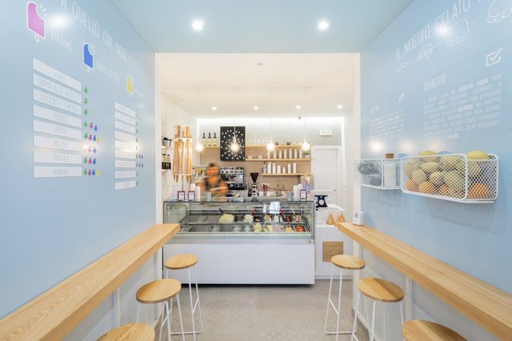 Bright, Airy Cafe Design with Sleek Ice Cream Display and Cozy Minimalist Decor