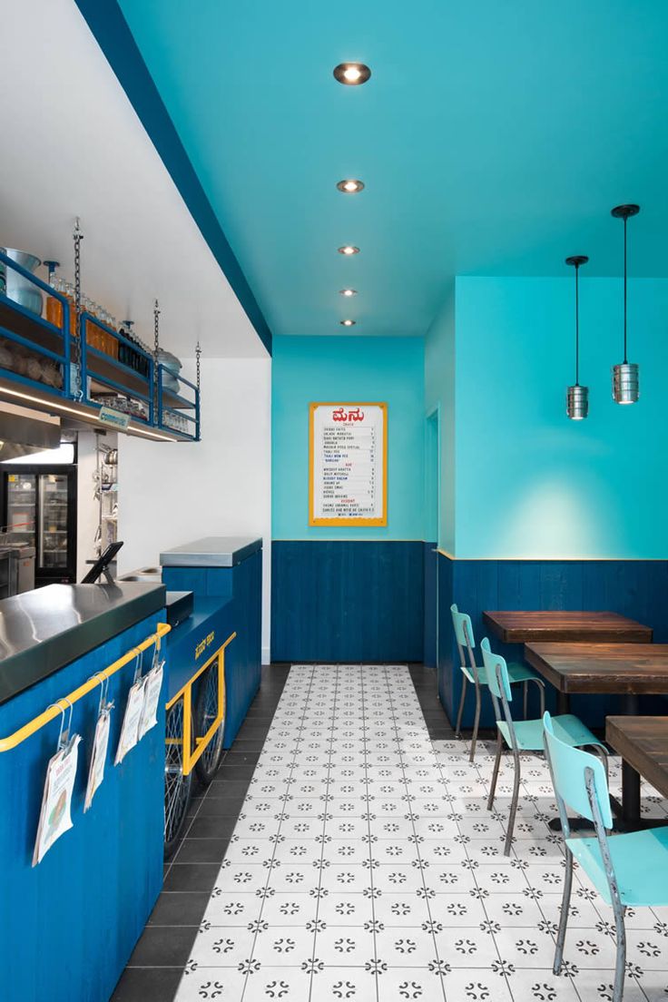 Vibrant Cafe Design: A Harmonious Blend of Color, Texture, and Modern Aesthetics