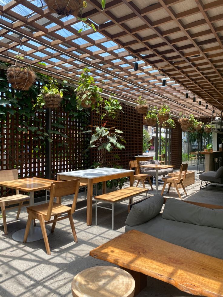 Inviting Cafe Design Harmonizes Indoor and Outdoor Spaces for Tranquility and Comfort