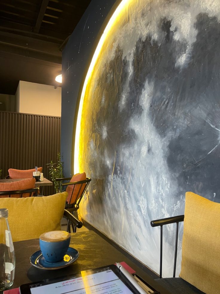 Cosmic-Themed Cafe Design Blends Artistic Flair with Cozy Ambiance