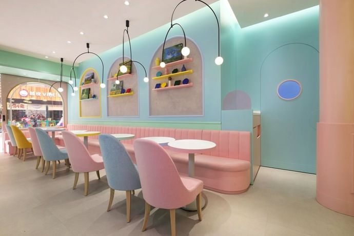 Playful Cafe Design: A Vibrant Blend of Pastels and Modern Comfort