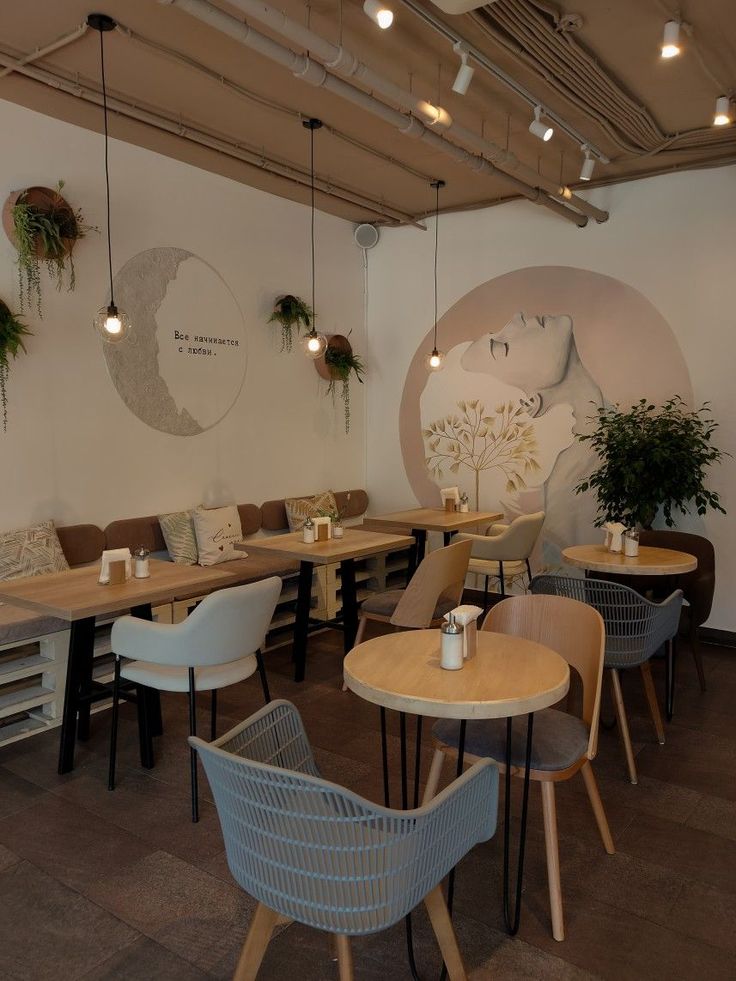 Cozy Modern Cafe: A Warm and Inviting Space with Artistic Murals and Stylish Seating