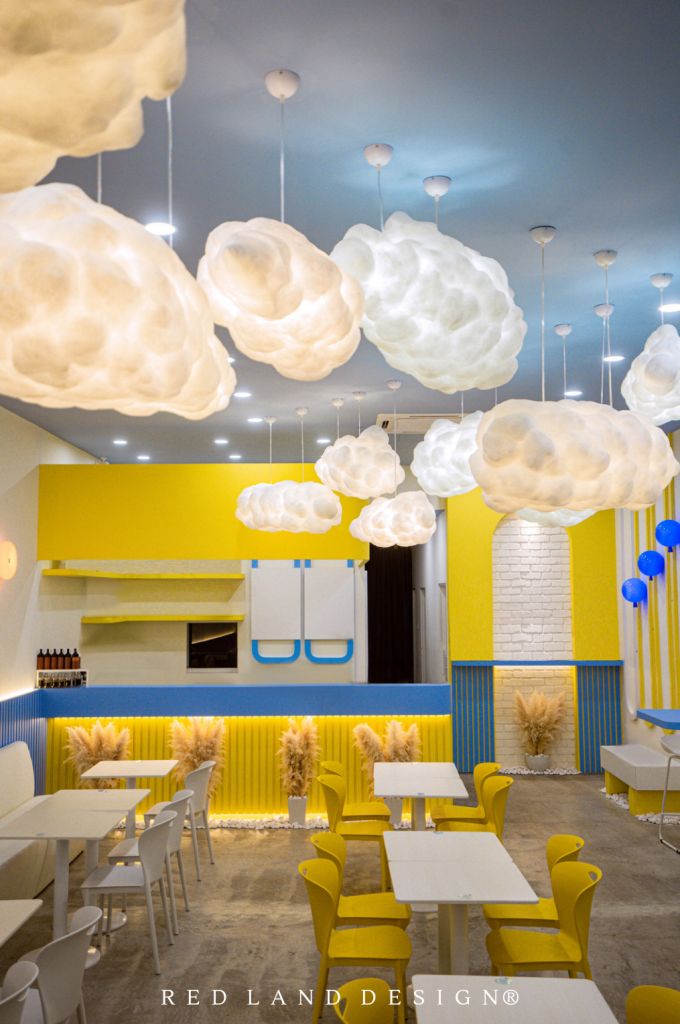 Whimsical Cafe Design: A Playful Atmosphere with Dreamy Lighting and Modern Accents