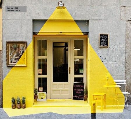 Cheerful Cafe Design with Vibrant Yellow Exterior and Playful Details