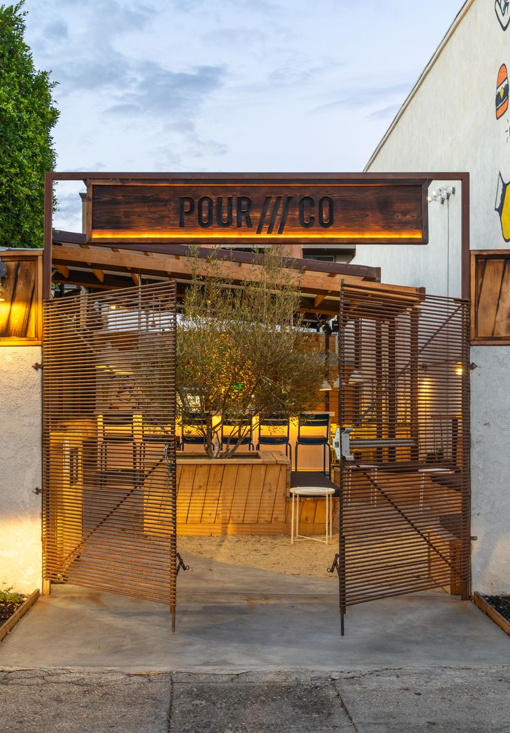 Inviting Cafe Entrance Blends Rustic Charm and Modern Design for a Cozy Atmosphere