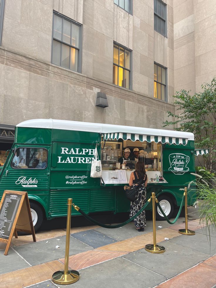 Charming cafe design with a vintage-inspired food truck, elegant queueing area, and lush greenery for a cozy upscale dining atmosphere