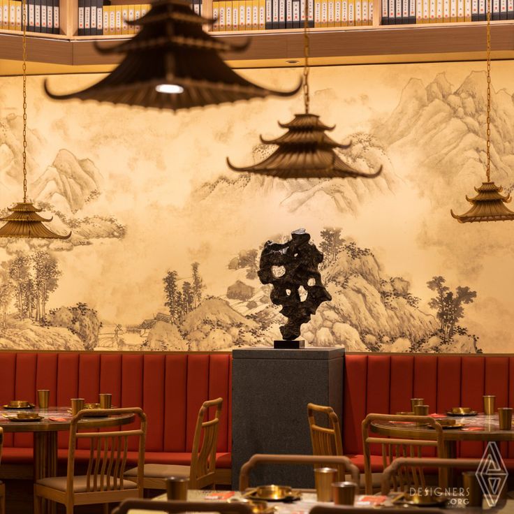 Chic Cafe Design Merges Tradition and Modernity with Striking Murals and Elegant Decor