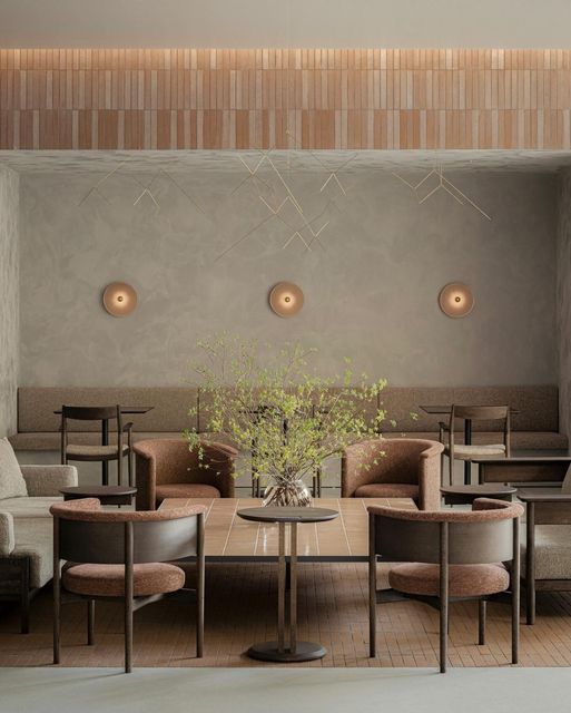 Cozy and Contemporary: A Warm, Minimalist Cafe Design with Natural Elements