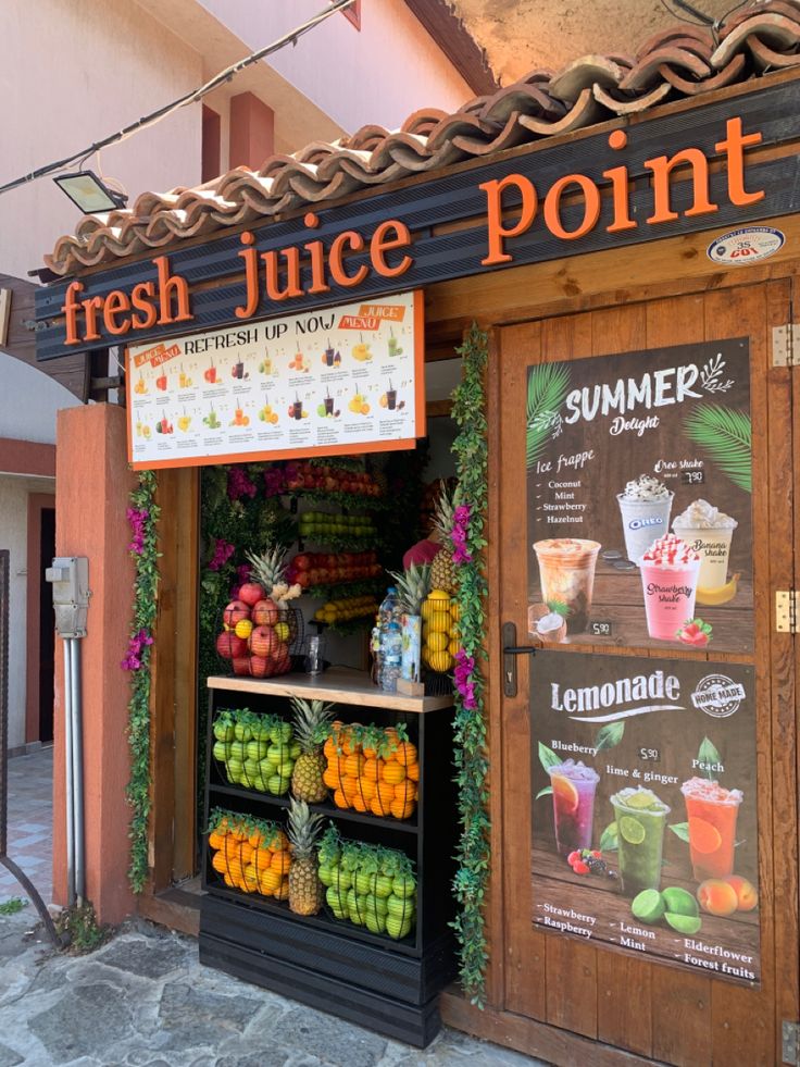 Charming Cafe Design: Inviting Entrance with Rustic Decor and Vibrant Fruit Displays