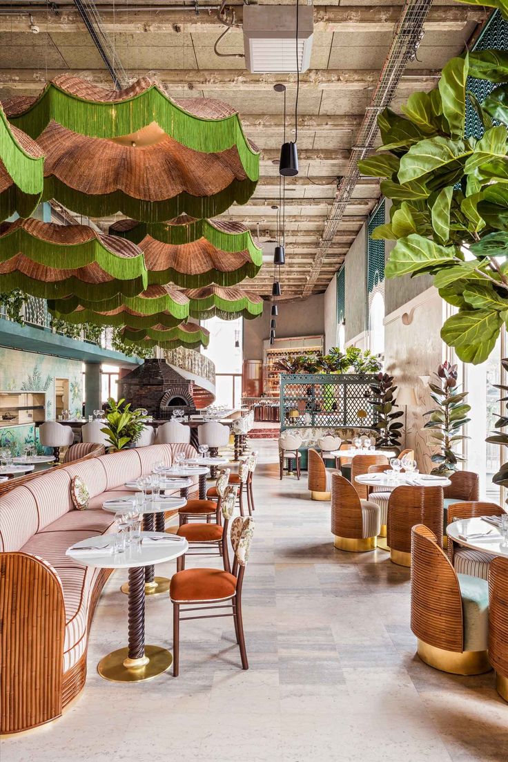 Chic Cafe Design Blends Vibrant Atmosphere with Comfort and Natural Elements