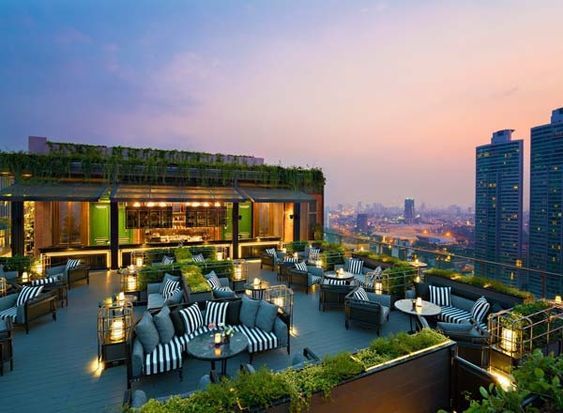 Luxurious Rooftop Cafe Terrace: A Serene Urban Escape with Stylish Design and Natural Beauty