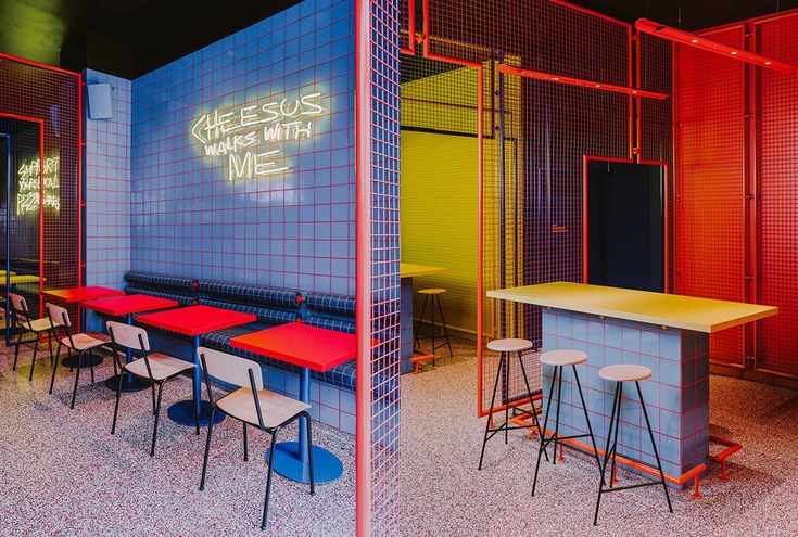 Vibrant Modern Cafe Design Merges Bold Colors and Sleek Minimalism for an Engaging Experience