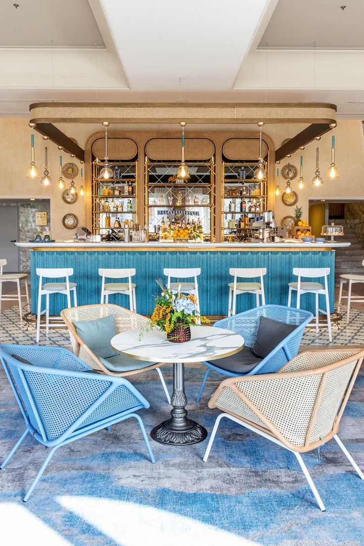 Vibrant Cafe Design with Striking Bar and Inviting Seating for Social Gatherings