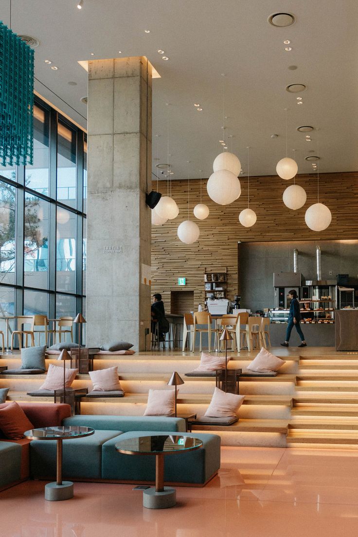 Harmonious Cafe Design: A Serene Blend of Modern and Natural Elements