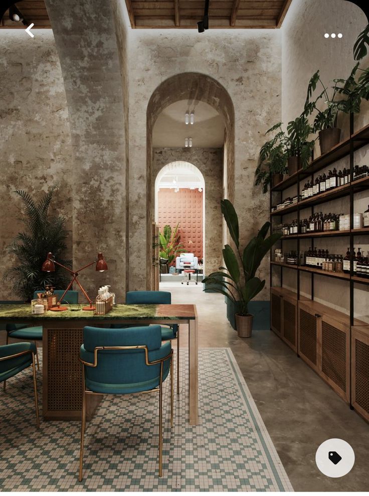 Inviting Cafe Design Blends Textured Walls, Natural Materials, and Lush Greenery for a Contemporary Atmosphere