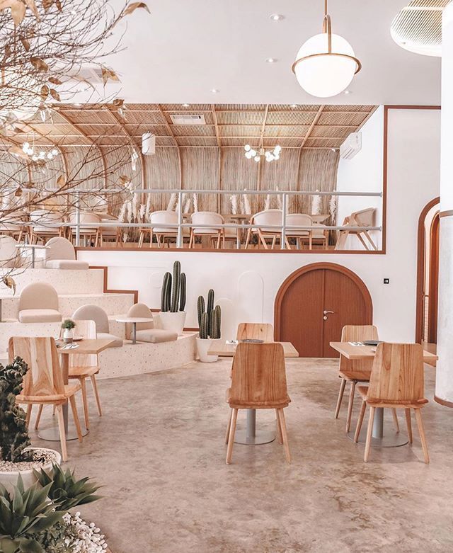 Modern Cafe Design Embraces Natural Textures and Serene Aesthetics