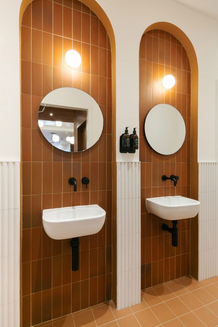 Modern Bathroom Design: A Harmonious Blend of Warm Terracotta, Elegant Arches, and Striking Contrasts