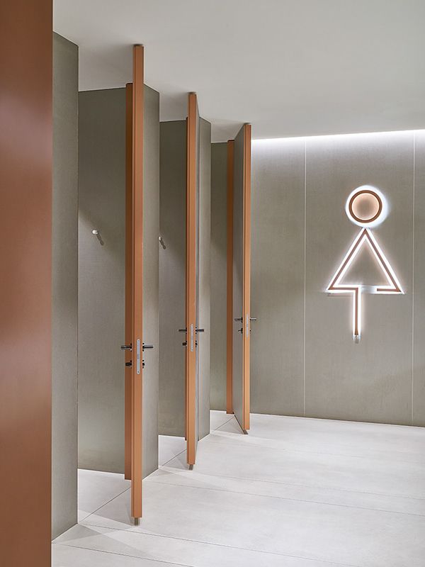 Modern Restroom Design: Sleek Aesthetics, Inviting Atmosphere, and Functional Accessibility for Cafes