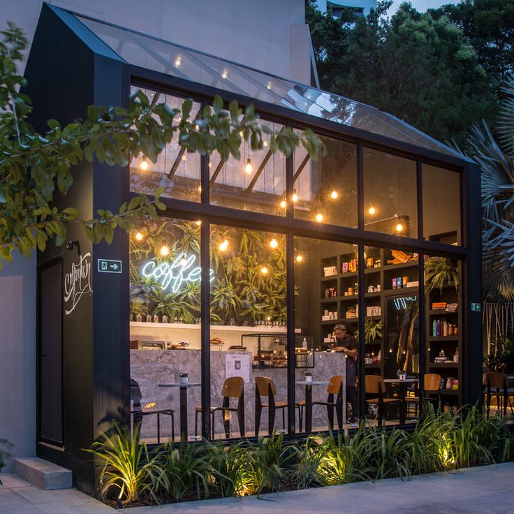 Modern Glass-Facade Cafe: A Serene Blend of Nature and Contemporary Design