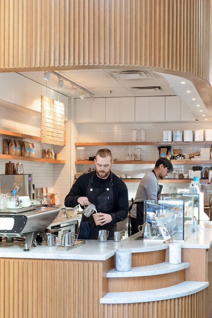 Modern Cafe Design: An Inviting Space with Clean Lines, Warm Accents, and Open Layout