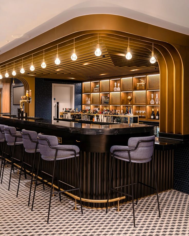 Modern Cafe Bar Design: Merging Luxury and Comfort with Striking Textures and Elegant Accents