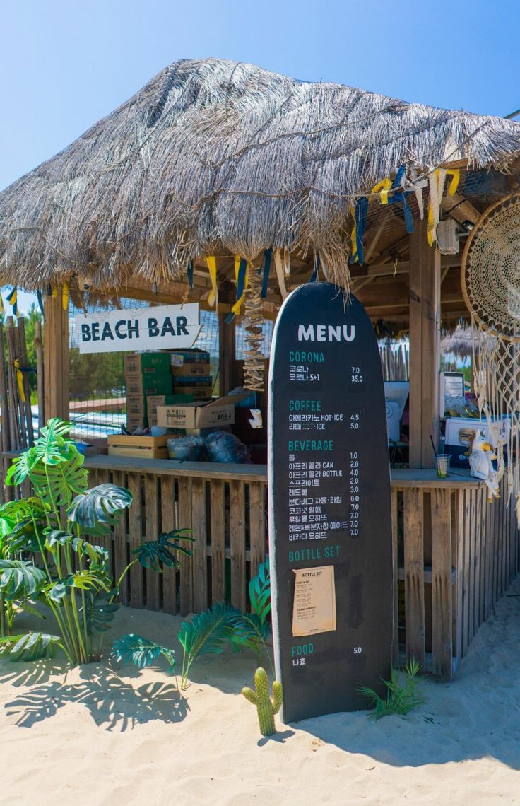 Vibrant Beach Bar Cafe Design: Rustic Thatched Roof, Tropical Vibe, and Inviting Atmosphere