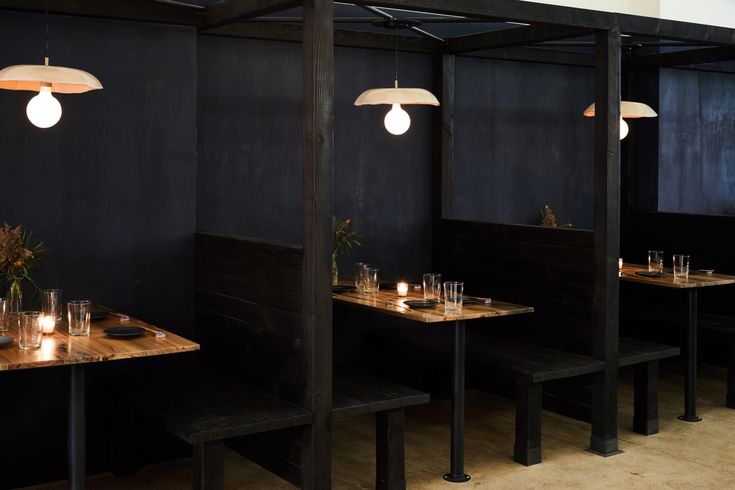 Cozy Cafe Design: Intimate Wooden Booths and Minimalist Aesthetics Create a Sophisticated Atmosphere