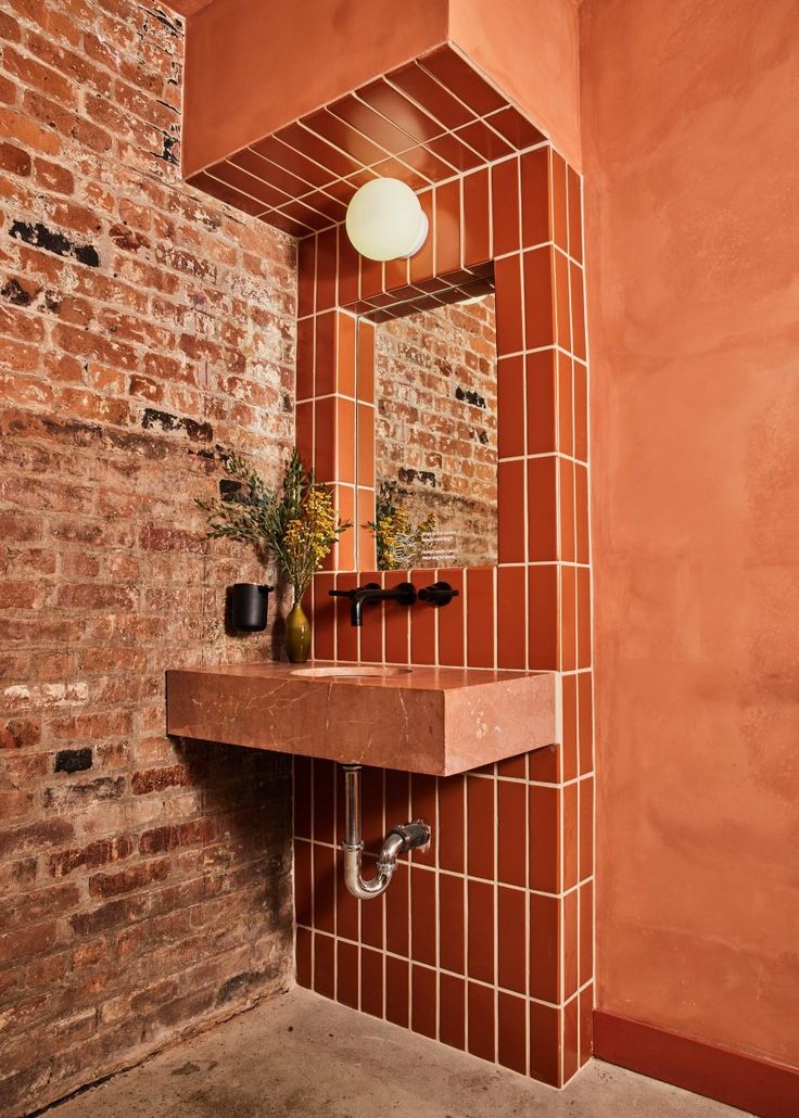 Cozy and Stylish Cafe Restroom Blends Rustic and Modern Design Elements