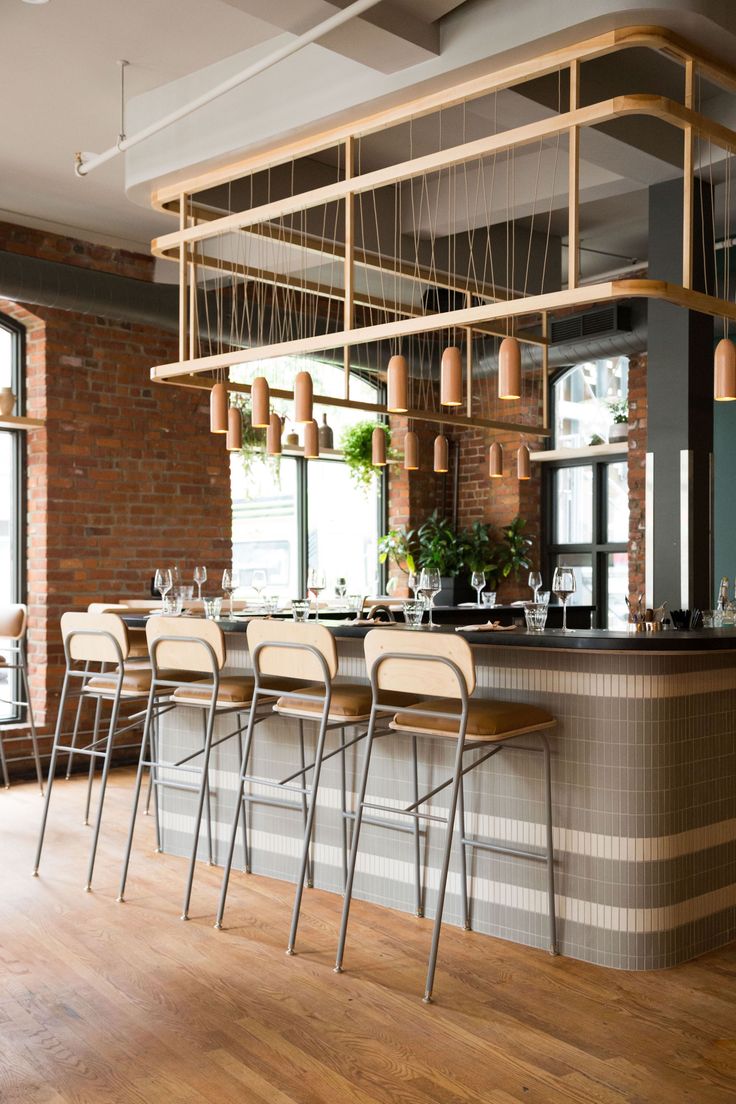 Modern Cafe Design Blends Warm Materials and Natural Light for an Inviting Atmosphere