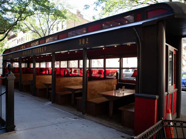 Charming Cafe with Vintage Streetcar Feel and Inviting Outdoor Seating