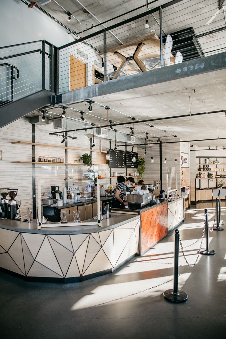 Contemporary Cafe Design: A Welcoming, Light-Filled Space with Stylish Details and Inviting Atmosphere