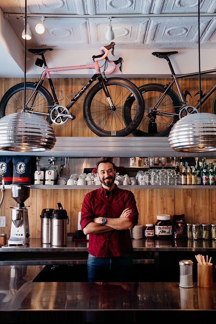 Warm and Inviting Cafe Design with Modern Elements and Personality-Infused Decor