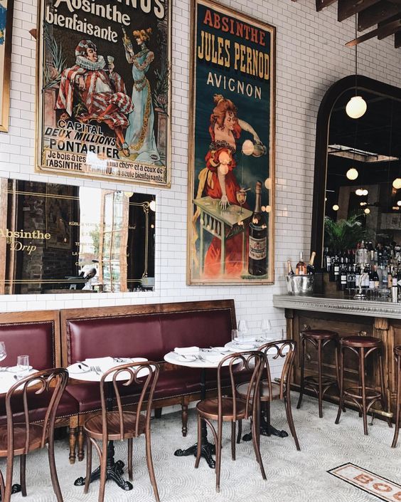 Charming Vintage Cafe Design: A Harmonious Blend of Rich Wood, Dark Leather, and Nostalgic Decor