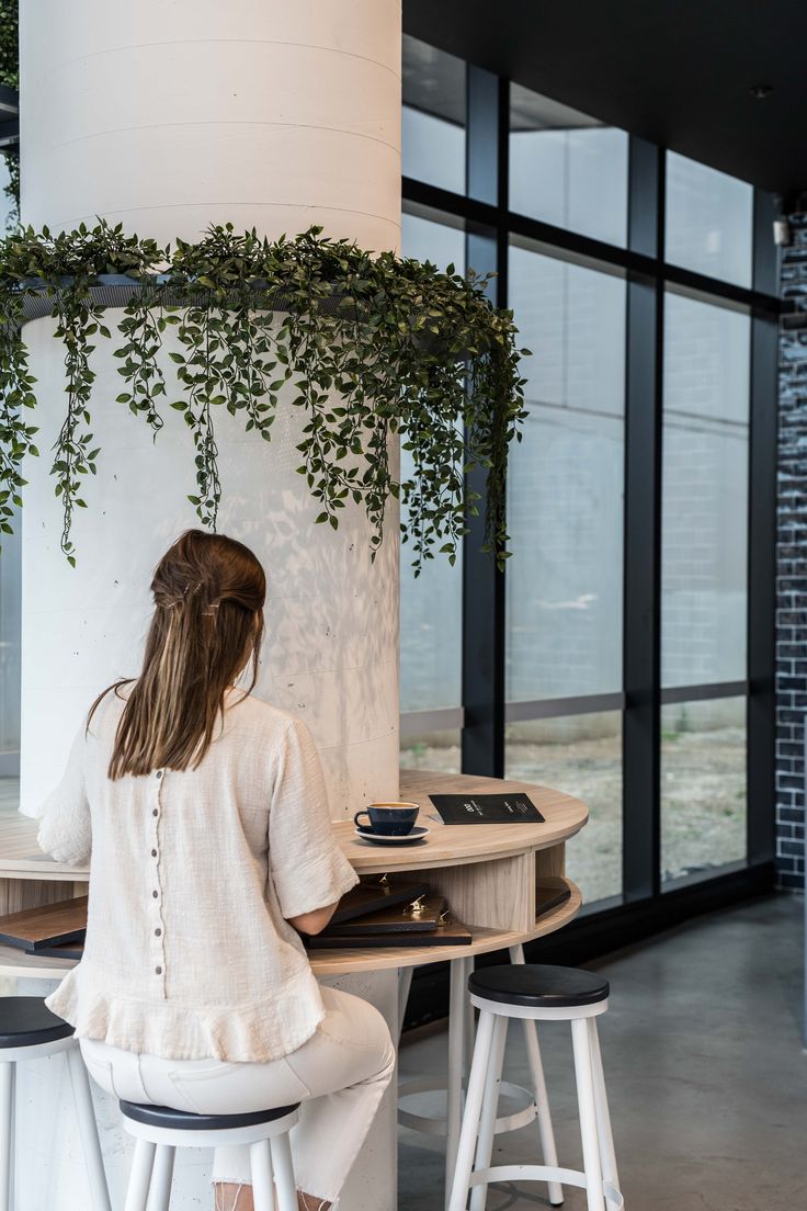 Modern Minimalist Cafe Design Emphasizes Natural Light and Comfort