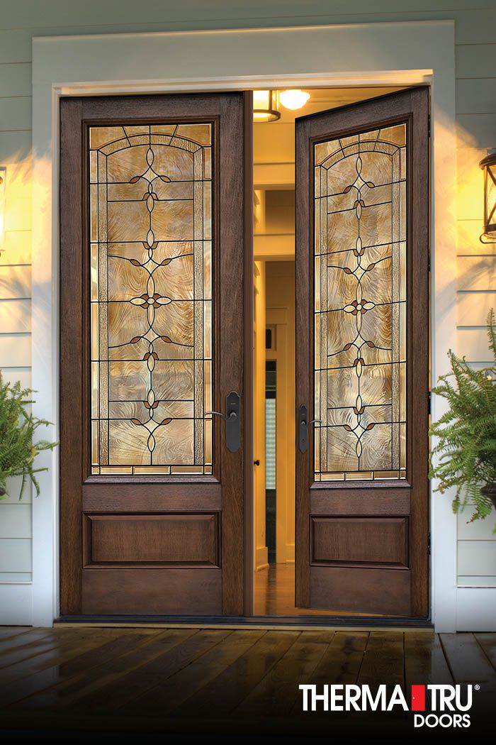 Elegant Double Door Design with Geometric Glass and Rich Wood Enhances Cafe Ambiance