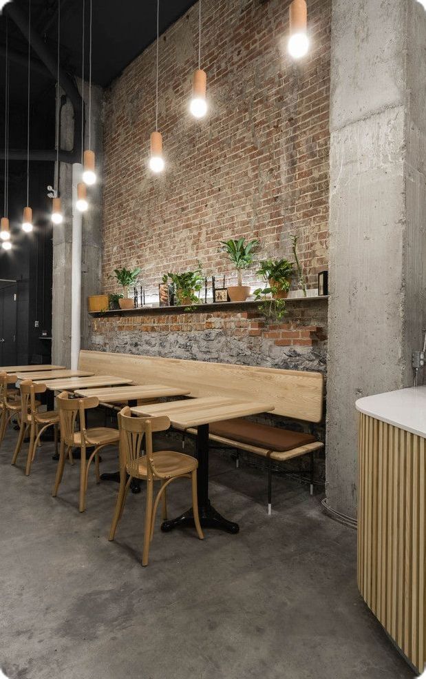 Cafe Design Harmonizes Rustic and Modern Elements for an Inviting Atmosphere