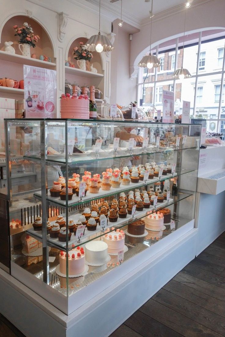 Charming Cafe Design Showcases Colorful Pastries in a Bright, Inviting Atmosphere