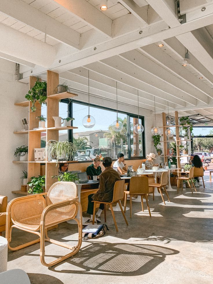 Modern, Airy Cafe Design Featuring Natural Light and Inviting Atmosphere