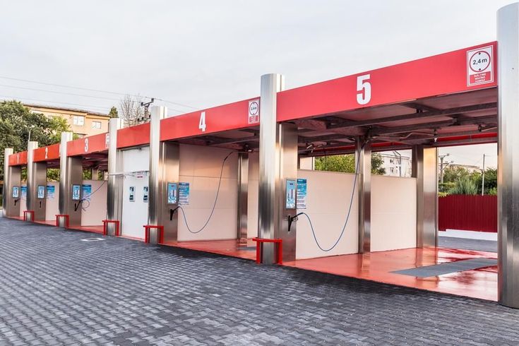 Modern Car Wash Station Design: Efficient, Aesthetically Pleasing with Bright Accents and Natural Greenery